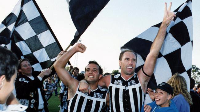 George Fiacchi, left, and Roger Delaney celebrate Port’s 1992 SANFL grand final win. Picture: News Corp.