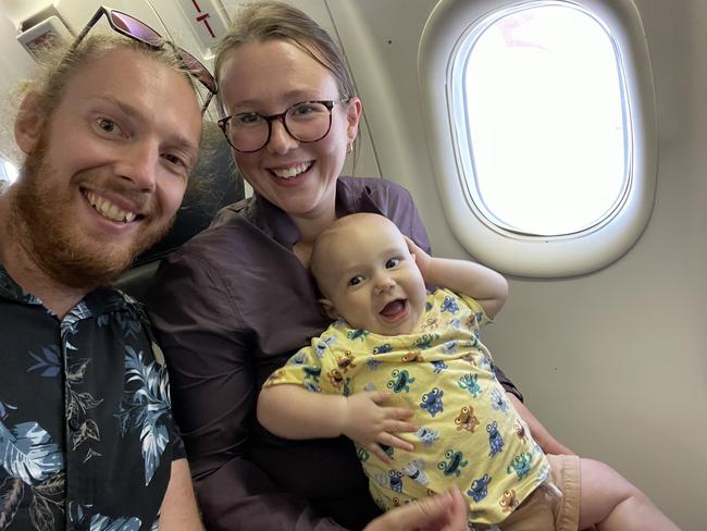 Nic van Essen, Joanna Benjamin and son George on one of their many trips between Devonport and Melbourne. Picture: Supplied