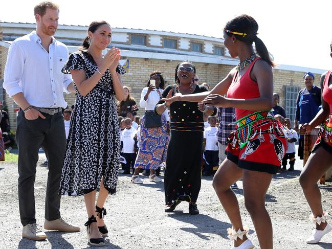 Dancers performed for Harry and Meghan during their visit to a Justice Desk initiative in Nyanga township in Cape Town. Picture: Getty Images