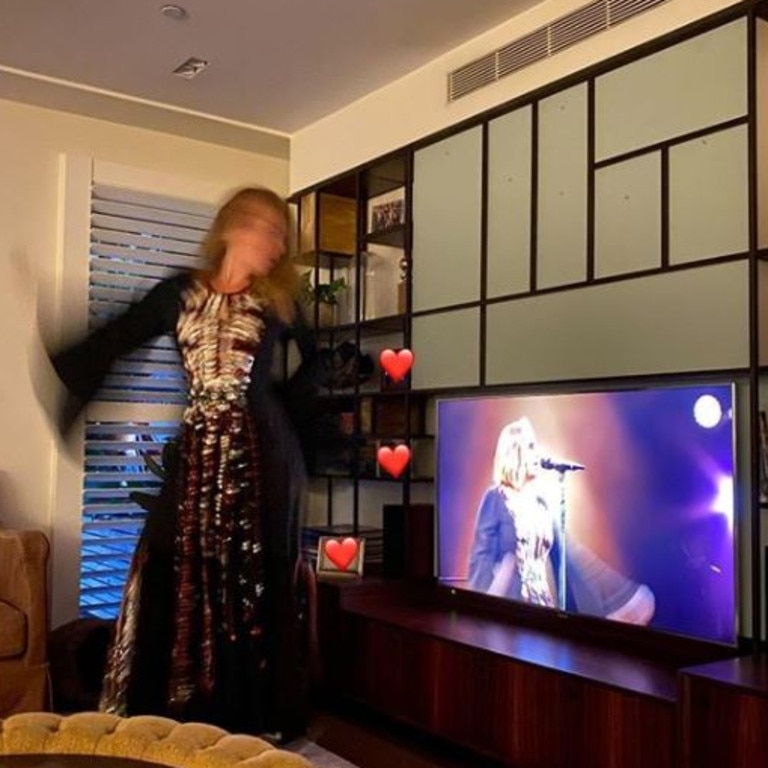 Adele has been sharing photos of herself dancing inside her Beverly Hills home.