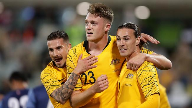 CANBERRA, AUSTRALIA - OCTOBER 10: Harry Souttar of the Socceroos celebrates scoring a goal with team mates during the FIFA World Cup Qatar 2022 and AFC Asian Cup China 2023 Preliminary Joint Qualification Round 2 match between the Australian Socceroos and Nepal at GIO Stadium on October 10, 2019 in Canberra, Australia. (Photo by Mark Metcalfe/Getty Images)