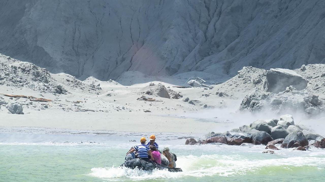 White Island tour operators tried rescuing people minutes after the volcano erupted. Picture: Michael Schade