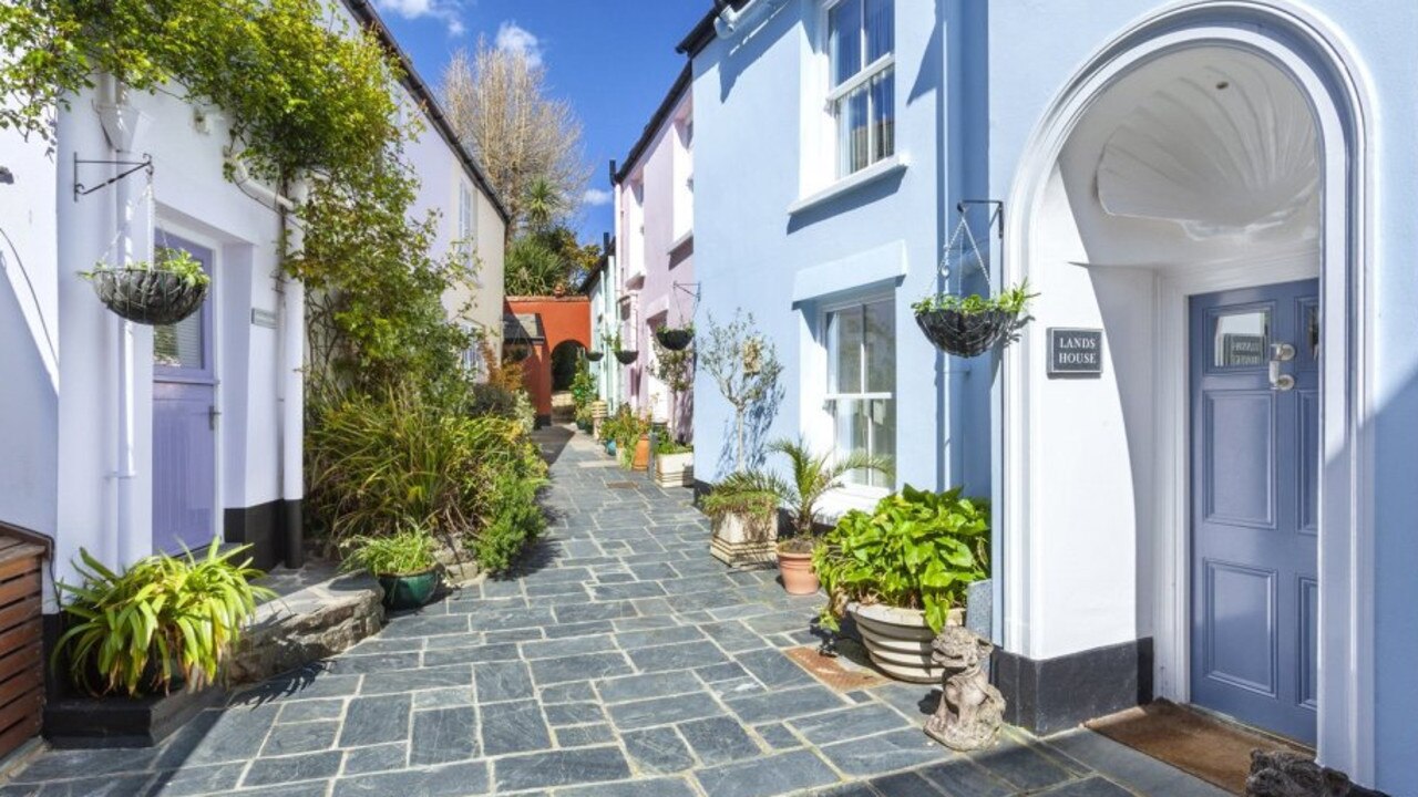 The mysterious door hides a ‘village within a village’ in Devon. Picture: Jackson-Stops.