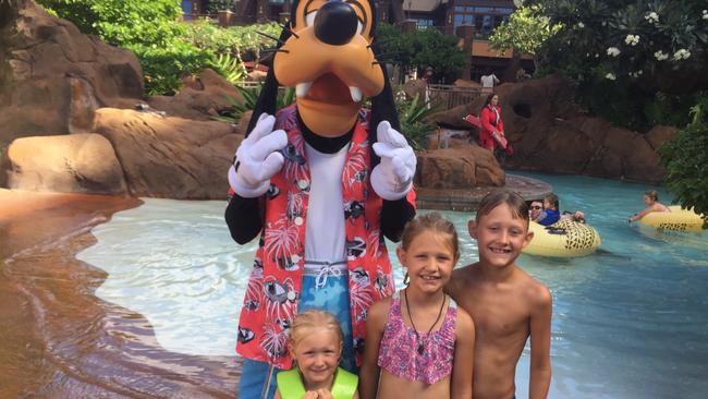 Brock with sisters Macey and Mea, 11 during a family holiday at Disney Aulani resort in Hawaii.