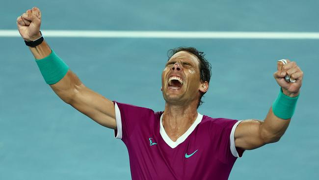 Rafael Nadal after claiming a record 21st grand slam title at Melbourne Park. Picture: Clive Brunskill/Getty