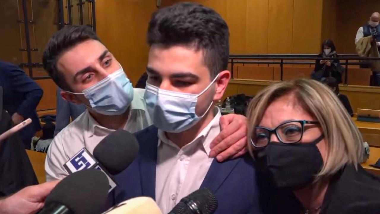 Alex Pompa (centre) after the trial where he was acquitted for the murder of his father Giuseppe in 2020, pictured with his mother (right) and brother (left). Picture: Newsflash/australscope