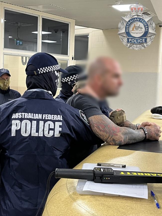 Mark Buddle with AFP officers.