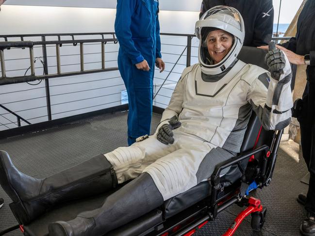 NASA astronaut Suni Williams gives a thumbs-up after being helped out of a SpaceX capsule onboard the SpaceX recovery ship Megan after landing in the water off the coast of Tallahassee, Florida. Picture: Keegan Barber/NASA via AP