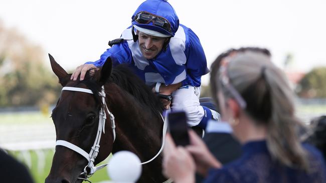 Winx and Hugh Bowman after winning the Queen Eizabeth Stakes at Randwick in April.