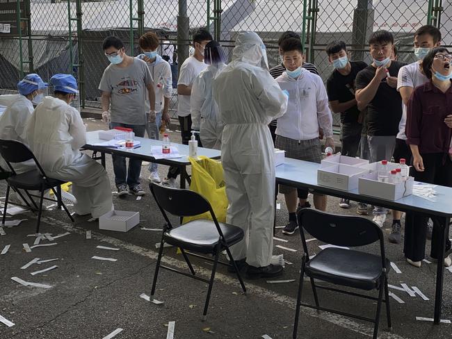 Beijing market workers are tested for coronavirus. Picture: Getty Images