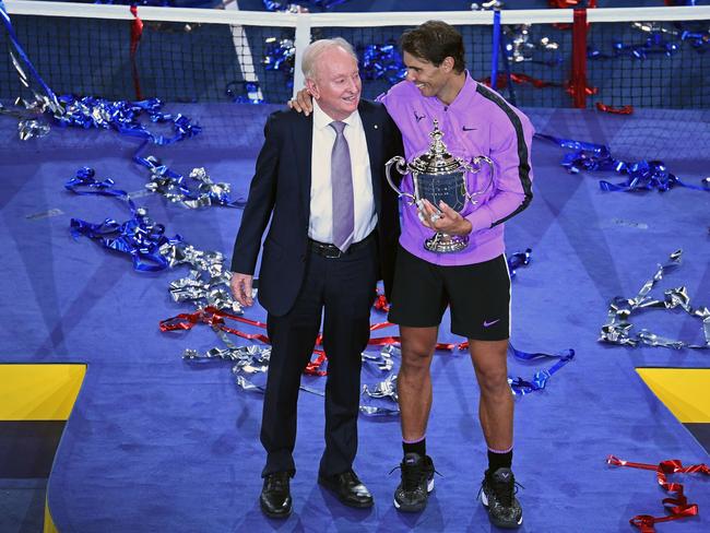 NEW YORK, NEW YORK - SEPTEMBER 08: Rafael Nadal (R) of Spain celebrates with the championship trophy alongside tennis champion Rod Laver (L) during the trophy presentation ceremony after winning his Men's Singles final match against Daniil Medvedev of Russia on day fourteen of the 2019 US Open at the USTA Billie Jean King National Tennis Center on September 08, 2019 in the Queens borough of New York City.   Emilee Chinn/Getty Images/AFP == FOR NEWSPAPERS, INTERNET, TELCOS & TELEVISION USE ONLY ==