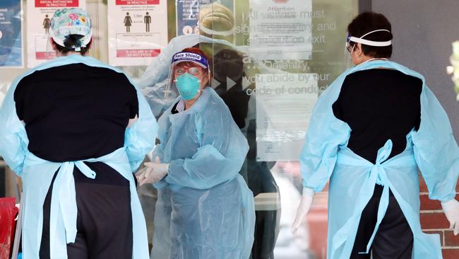 Workers at the Arcare Maidstone Aged Care facility in Melbourne. Picture: David Crosling