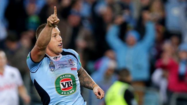 Trent Hodkinson celebrates his try to win the 2014 State of Origin series at ANZ Stadium