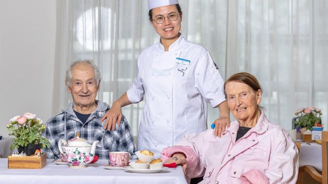 Aged Care Quality and Safety Commission Chef Yan Xu and residents of St Bedes aged care home Gloria Mcara and Arthur Andonpoulos enjoying the food that is being prepared at the aged care home. Picture Thomas Lisson