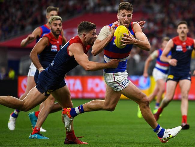 Marcus Bontempelli gathers the ball under pressure. Picture: Daniel Carson/AFL Photos via Getty Images