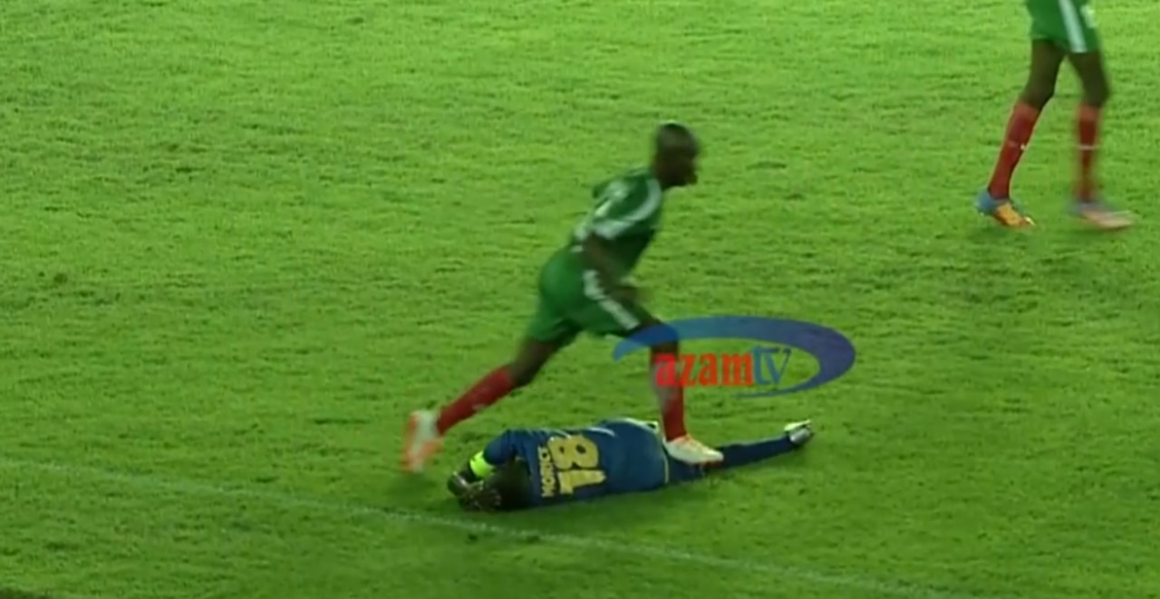 A Burundi player tackles and stomps on the Tanzania captain.
