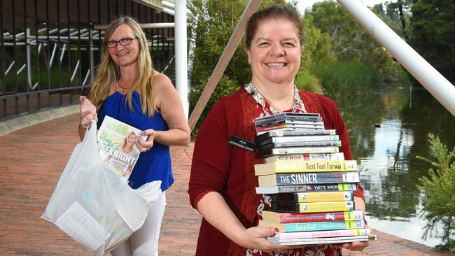 Croydon librarians Rose Gray and Ajne Graham have been preparing book bags for library users during the coronavirus outbreak. Picture: Josie Hayden