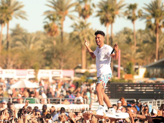 Kyle crowd surfed ... on an actual surfboard. Picture: Getty Images