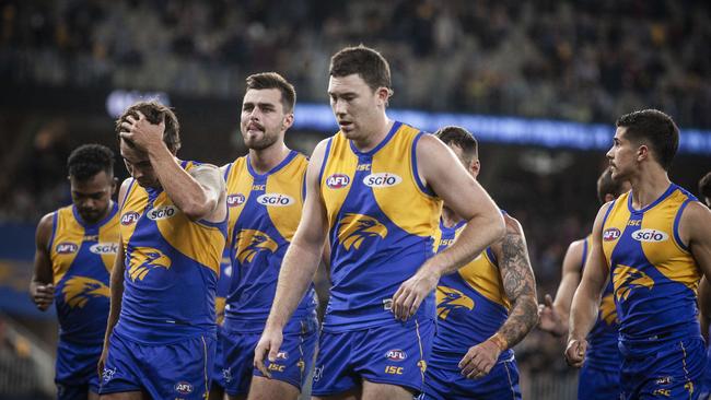 The Eagles leave the oval after defeat against Essendon at Optus Stadium on Thursday night. Picture: AAP