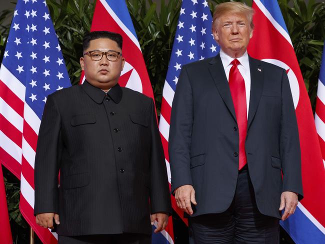 US President Donald Trump stands with North Korean leader Kim Jong Un during their historic meeting in Singapore. Picture: AP