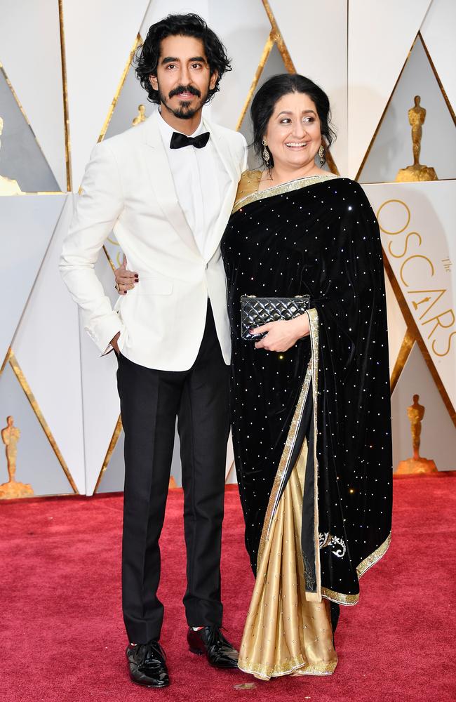 Oscar nominee Dev Patel is even more adorable now that he’s taken his mother Anita Patel as his date. Picture: Getty Images