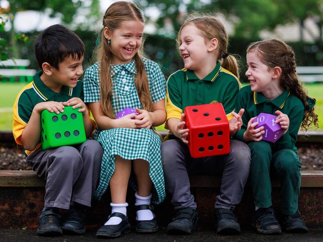 Daily Telegraph. 23, May, 2025.(Story-Windsor Public School has become the first school in NSW to use a work-in-progress numeracy check)Riley Holden, 5, Mila Scerri, 6, Isaac Hall, 6, and Audrey Hurdis, 6, at Windsor Public School, today.Picture: Justin Lloyd.