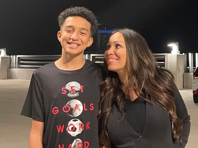 In this undated photo provided by Megan Garcia of Florida in October 2024, she stands with her son, Sewell Setzer III. The mother of 14-year-old Sewell Setzer III is suing Character.AI, the tech company that created a 'Game of Thrones' AI chatbot she believes drove him to commit suicide on Feb. 28. (Megan Garcia via AP)