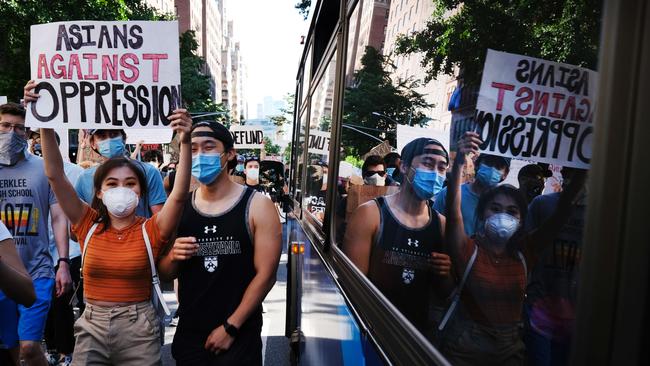 Protesters march in New York City.