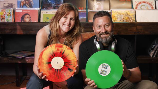 Kathy and Neil Wilson with some of the fruits of their labour at Suitcase Records. Picture: Glenn Hunt