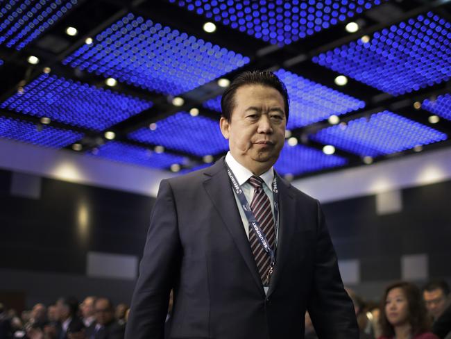 FILE - In this July 4, 2017 file photo, Interpol President, Meng Hongwei, walks toward the stage to deliver his opening address at the Interpol World congress in Singapore. A French judicial official says Friday Oct.5, 2018 the president of Interpol has been reported missing after traveling to China. (AP Photo/Wong Maye-E, File)