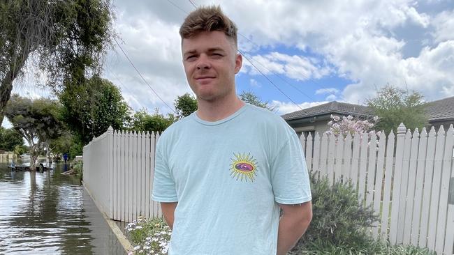 Mooroopna's Jhett Cooper, 20, outside his flooded home. Picture: Kiel Egging