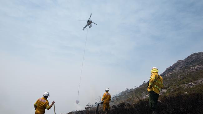 Tasmania Fire Service firefighters at the Gell River fire. Picture: WARREN FREY/TASMANIA FIRE SERVICE