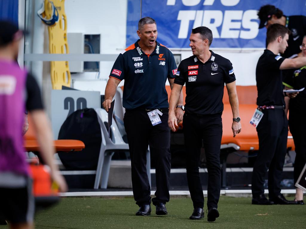 Adam Kingsley and Craig McRae, Senior Coach of the Magpies shake hands after their Opening Round clash. Picture: Dylan Burns/AFL Photos via Getty Images.