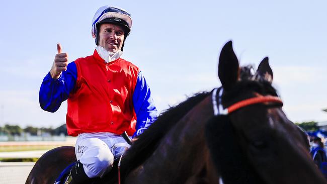 Tommy Berry on Hilal salutes as he returns to scale after winning the Bondi Stakes at Randwick last year. Picture: Getty Images