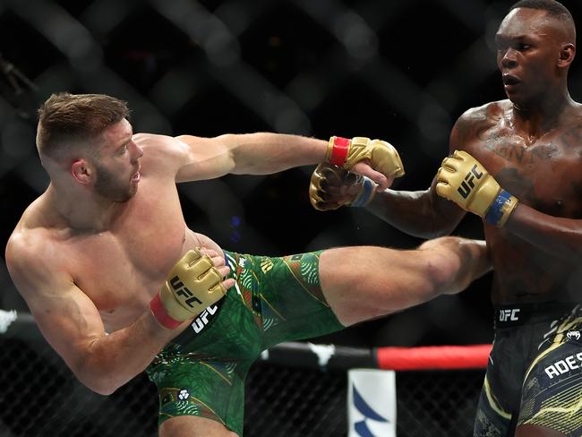 Dricus du Plessis (L) defended the middleweight title against Israel Adesanya in Perth in August. Picture: Paul Kane/Getty Images