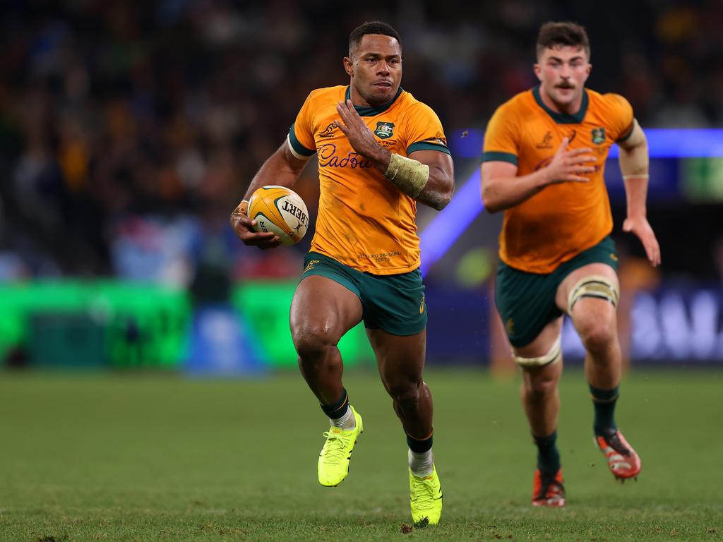 Filipo Daugunu makes a break on his way to a try in the clash with Wales. Picture: Jason McCawley/Getty Images