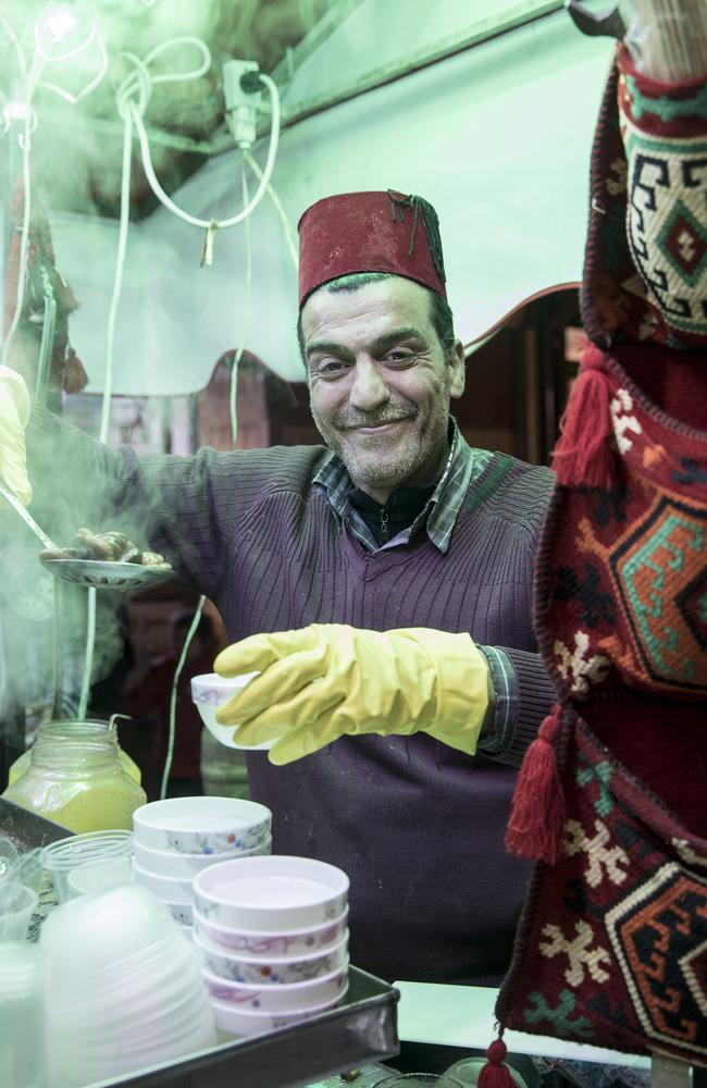 Mohammed Emad selling bean snacks in the Damascus Old City. Picture: Ella Pellegrini 