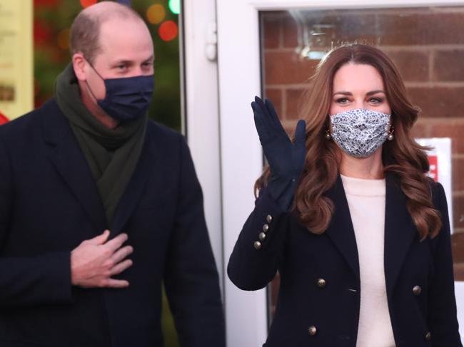 BATLEY, UNITED KINGDOM - DECEMBER 07: Prince William, Duke of Cambridge and Catherine, Duchess of Cambridge leaving Batley Community Centre, West Yorkshire after meeting volunteers who have supported elderly members of the community throughout the coronavirus outbreak, on the second day of a three-day tour across the country, on December 7, 2020 in Batley, England.  During the tour the royal couple will visit communities, outstanding individuals and key workers to thank them for their efforts during the coronavirus pandemic. (Photo by Danny Lawson - WPA Pool/Getty Images)