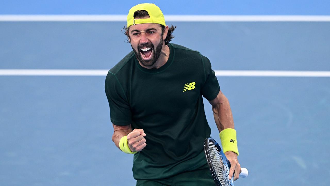 Jordan Thompson celebrates victory over Matteo Berrettini.