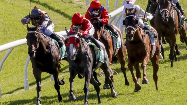 Military Mission (red blinkers) can bounce back from his close second to Hameron at Gosford last week. Picture: Getty Images