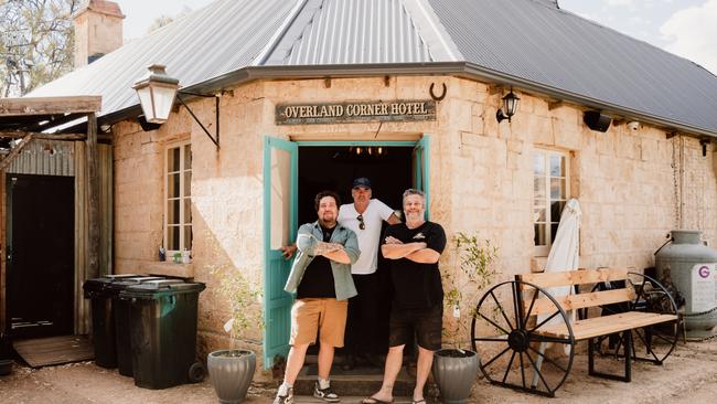 Duncan Welgemoed, Mark Best, Overland Corner Hotel publican Brad Flowers at the historic hotel. Picture: File