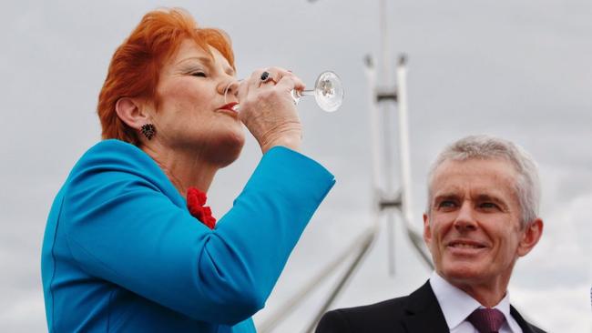 One Nation Senators Pauline Hanson and Malcolm Roberts celebrated Donald Trump’s victory in the US with a glass of champagne. Picture: ABC/Twitter