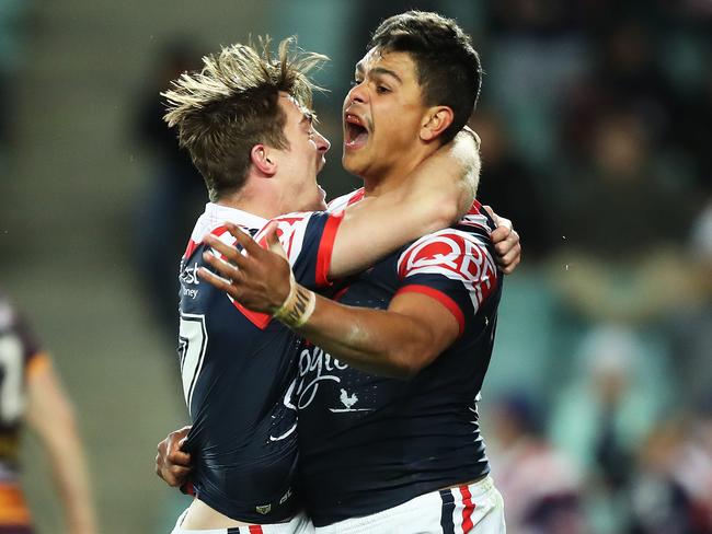 Latrell Mitchell celebrates his matchwinning try with Connor Watson. Picture: Brett Costello