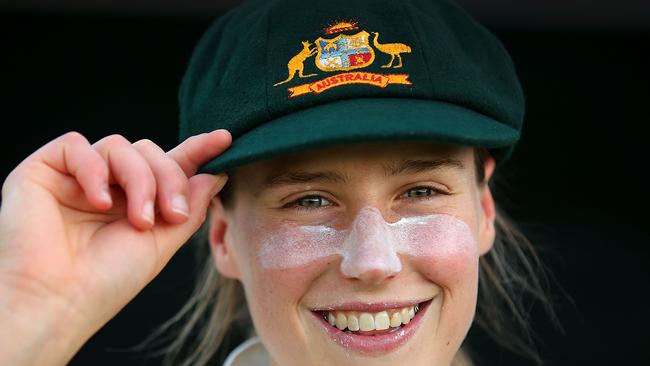 Australian player Ellyse Perry wearing the women’s baggy green which features a gold ribbon under the coat of arms.