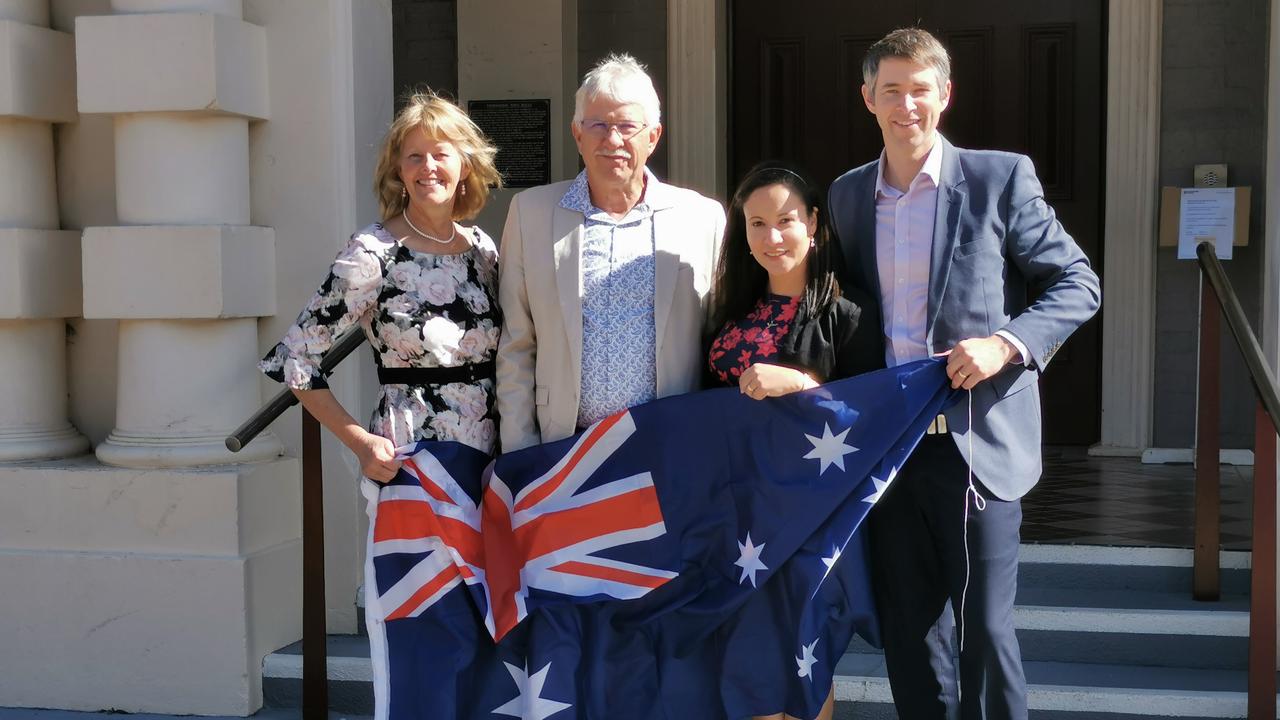 Andrea Gatfield celebrates with loved ones following her Australian citizenship ceremony.