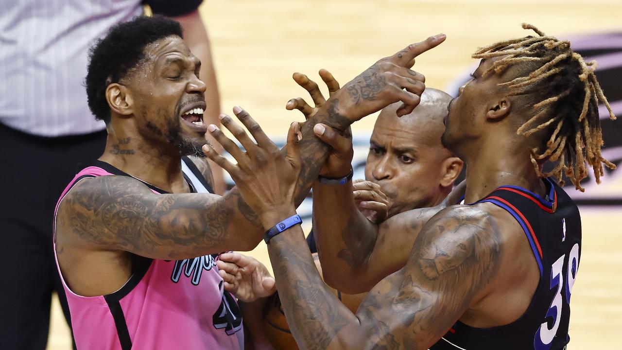 Miami’s Udonis Haslem (L) was ejected three minutes into his season debut.