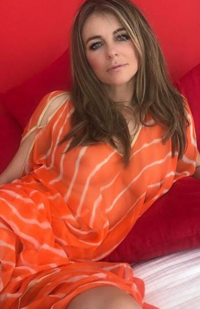 Liz Hurley in a revealing ‘sunshine’ kaftan. Picture: Instagram/Liz Hurley