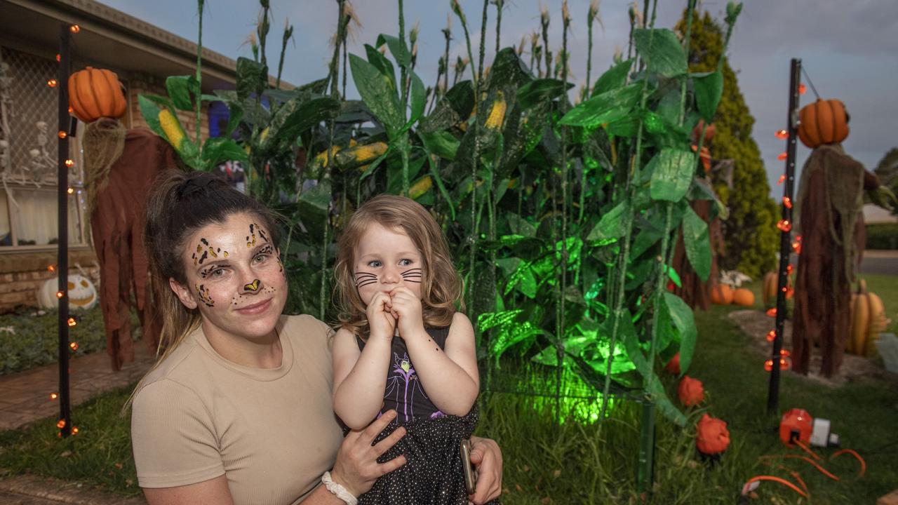 Sky Warry and Akyrah Warry visit the Halloween display of Jo Philp. Monday, October 31, 2022. Picture: Nev Madsen.