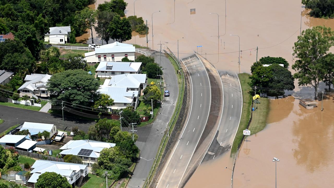 SUNSHINE COAST, AUSTRALIA - FEBRUARY 27: In an aerial view, floodwaters surround the town of Gympie on February 27, 2022 in an area north of Sunshine Coast, Australia. Parts of South-East Queensland are experiencing the worst flooding in over a decade, with Gympie under evacuation order and the death toll reaching five. (Photo by Bradley Kanaris/Getty Images)