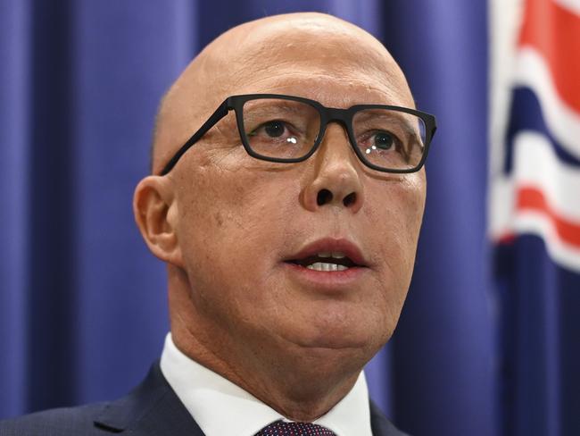 CANBERRA, AUSTRALIA - APRIL 5: Leader of the Opposition Peter Dutton and Deputy leader Sussan Ley address the media in the opposition party room. Federal Liberal MPs will campaign for a "no" vote in the referendum to enshrine an Indigenous Voice to parliament in the Constitution after the party room decided to formally oppose the proposal.The Liberal party room voted on Wednesday to reject the Albanese government's proposed model for a national Aboriginal and Torres Strait Islander advisory body, in favour of establishing local and regional Voices that would be legislated but not embedded in the Constitution. Picture: NCA NewsWire / Martin Ollman